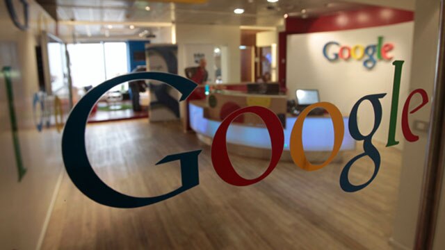 Interior view of a Google office featuring the company's logo.