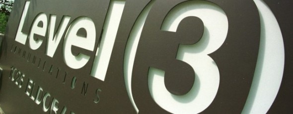 A close-up view of a sign displaying the name 'Level 3 Communications' with a stylized design.