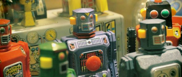 A collection of vintage robot toys with vibrant colors and various designs,set against a backdrop of nostalgic memorabilia.