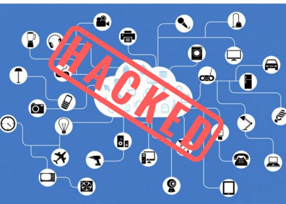 An illustration depicting various connected devices and appliances with a large 'HACKED' watermark across the center.