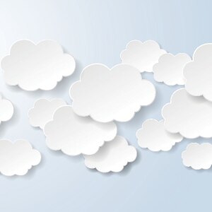 A seamless background featuring various white clouds on a light blue backdrop.