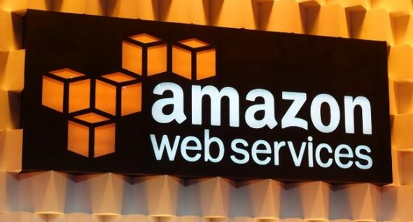 A sign displaying the Amazon Web Services (AWS) logo with three dimensional cubes.