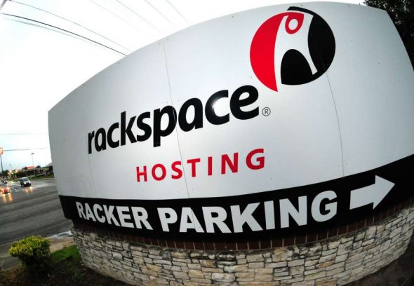 A large outdoor sign displaying the Rackspace logo and information about hosting services