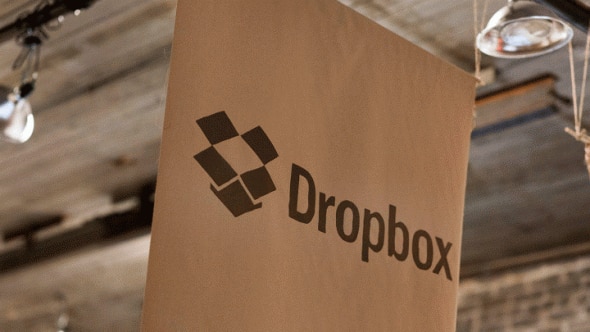 A banner displaying the Dropbox logo in a casual setting.