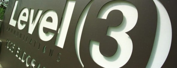 A close-up of a sign displaying the name 'Level 3 Communications' with a prominent '3'.