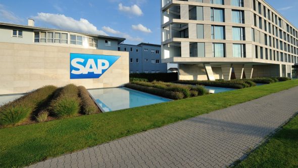 Exterior view of a modern building with a prominently displayed SAP logo.