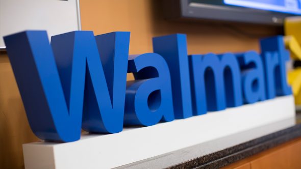 Blue 3D letters spelling 'Walmart' on a white base.