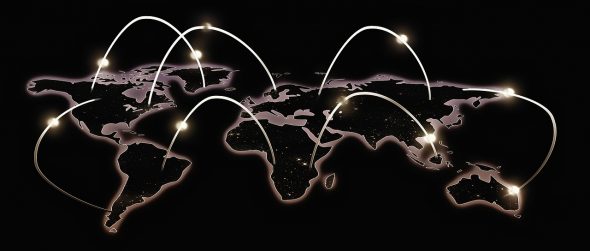 A stylized map of the world with glowing lines representing global connections and network routes.