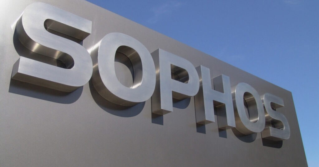 A close-up view of the 'SOPHOS' sign against a blue sky,featuring large metallic letters.