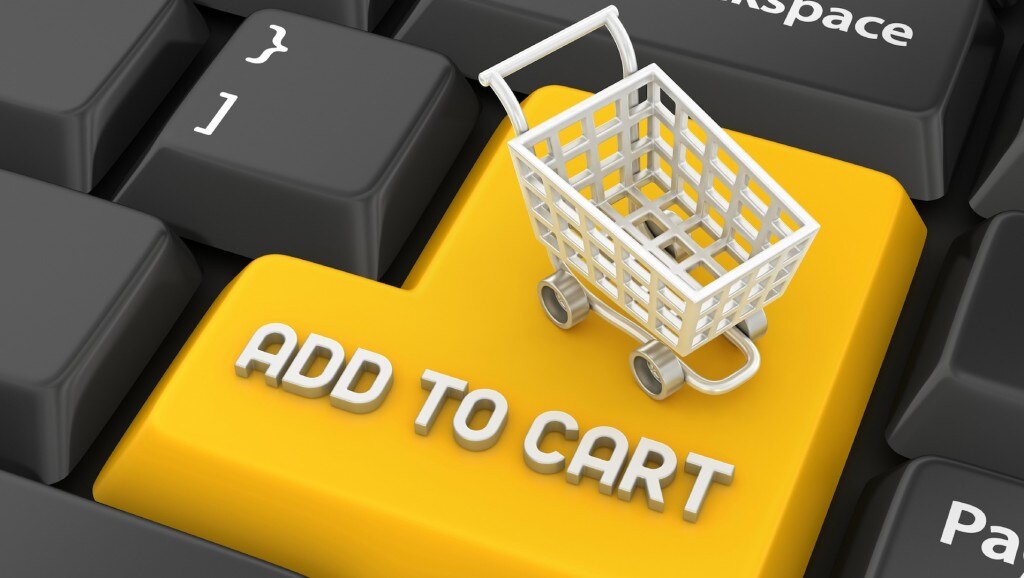 A computer keyboard key with an 'Add to Cart' label and a small shopping cart icon.