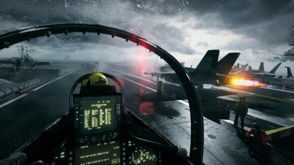 A cockpit view from a fighter jet on an aircraft carrier deck during a stormy weather