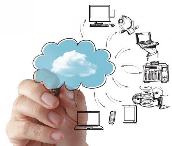 A hand drawing a cloud symbol with various digital devices and connections illustrating cloud computing concept.